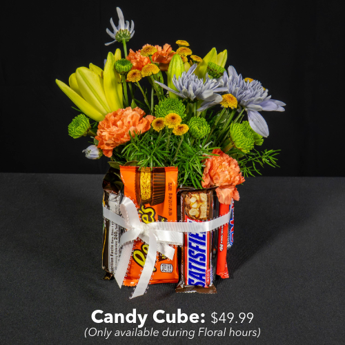 Candy Cube floral arrangement priced at $49.99. Please note this arrangement is only available during regularly scheduled Floral hours.